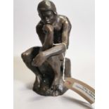 Bronzed cast iron figure