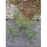 Metal garden table and four chairs.