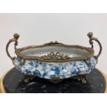 Gilt Bronze and Blue and White Dish with Brass handles. {22 cm H x 47 cm Wx 22 cm D}.