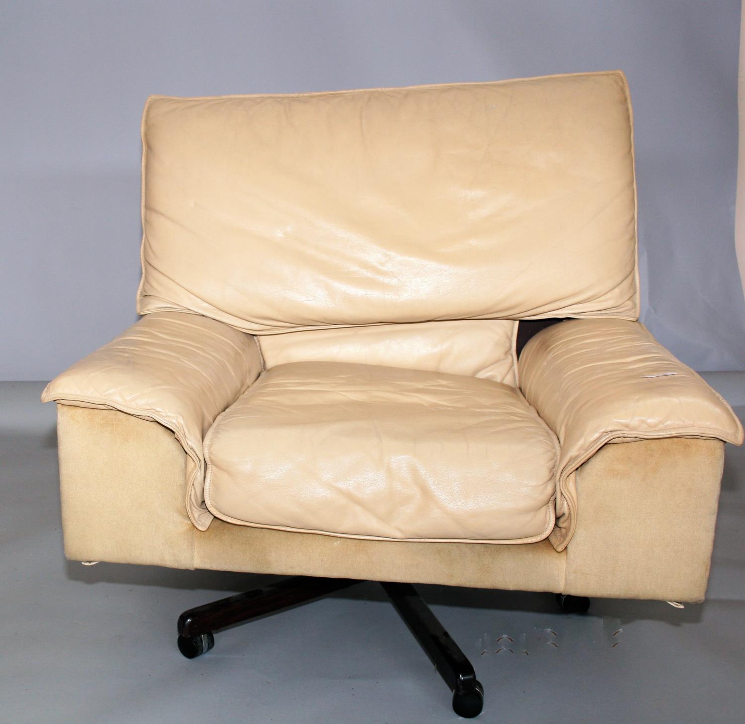 Mid century swivel leather and velvet arm chair. 95W x 90H x 90D