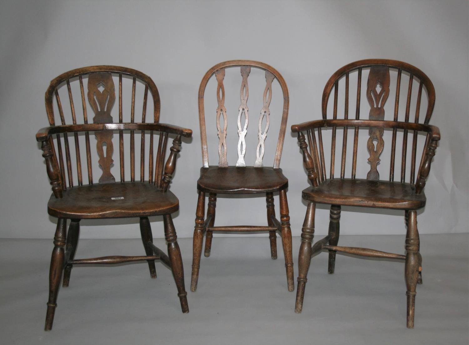 Two 19th Century Windsor arm chairs and other chair. 55W x 90H x 50