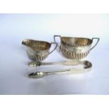 Victorian half fluted oval silver milk jug and sugar bowl, Sheffield 1898/1899, and a fiddle pattern