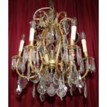 Antique brass and crystal six branch centre light. 50W x 70H