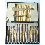 Set of six silver Queens pattern handled fish knives and forks, plus matching fish servers in