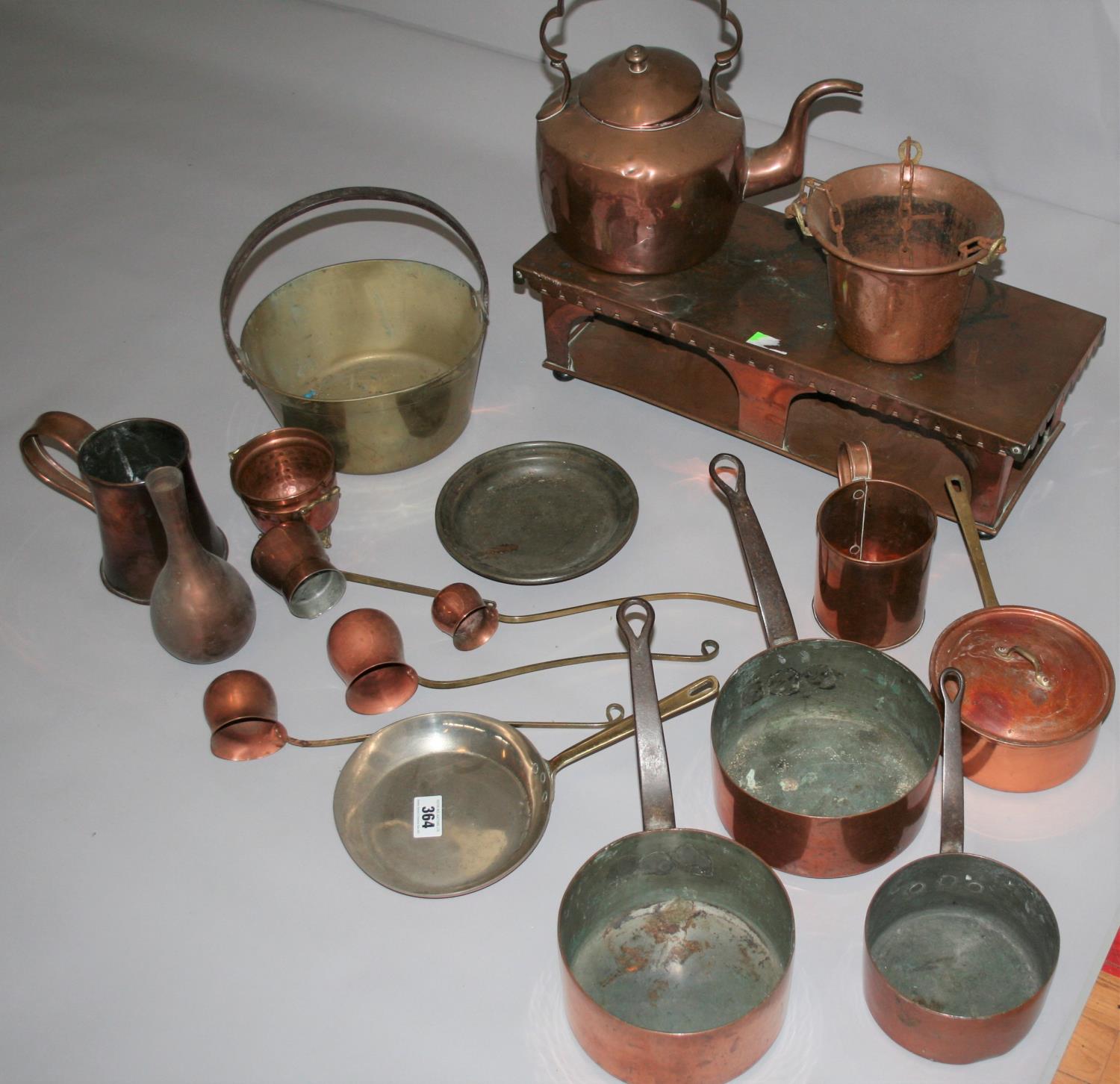 Good collection of copper saucepans etc.