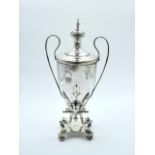 Antique silver plated classical shape tea urn with beaded borders. Height 15''