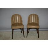 Set of two stylish caramel leather ribbed back chairs 23 W x 29 H x 18 D