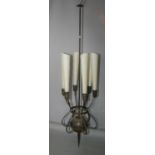 Unusual patinated medieval style centre light with parchments shades. 50W x 220H