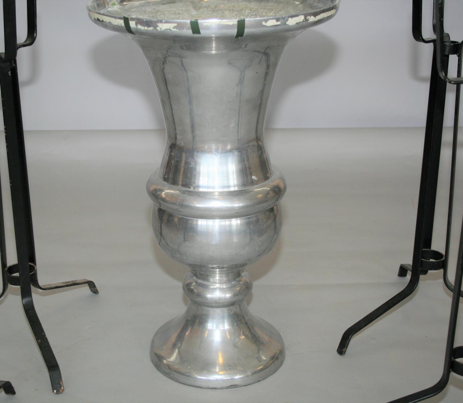 Chrome urn shaped vase (40W x 65H) and four black candle stand. - Image 2 of 3