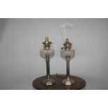 Fine pair of Edwardian silver plated oil lamps by HINKS, converted (damage to one bowl) 15 W x 50 H