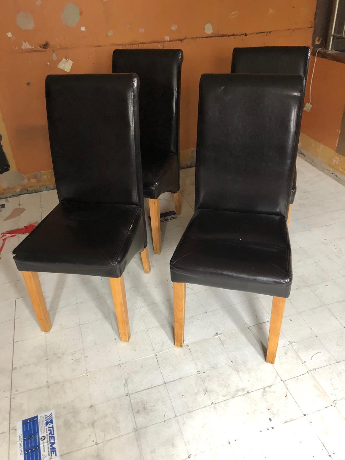 Set of six tallback, black leather restaurant chairs 44W 108H