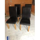 Set of six tallback, black leather restaurant chairs 44W 108H