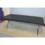 Cool leather topped designer desk on chrome base with X-shaped support 22 W x 72 H x 90 D