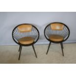 Matching pair of stylish circular framed chairs with leather upholstery 28 W x 31 H x 22 D