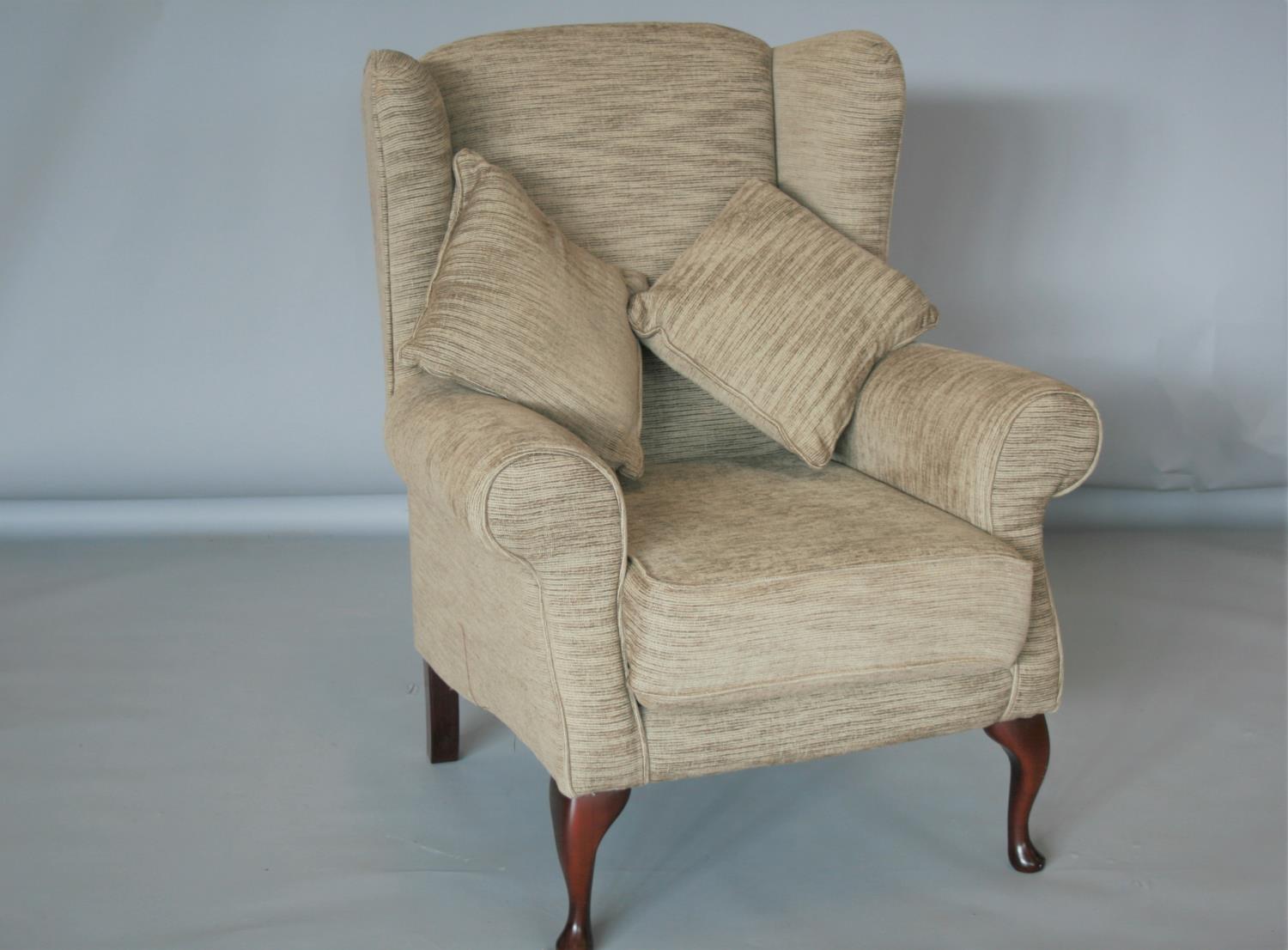 Quality wing backed armchair complete with two cushions.90W x 110H x 90 D