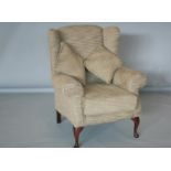 Quality wing backed armchair complete with two cushions.90W x 110H x 90 D