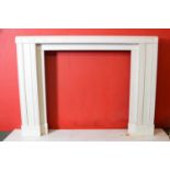 White marble Art Deco style fire surround . 140W 105H 20D