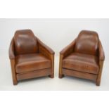 Pair of exceptional quality tan leather and walnut Art Deco style club chairs 80W 78H 92D