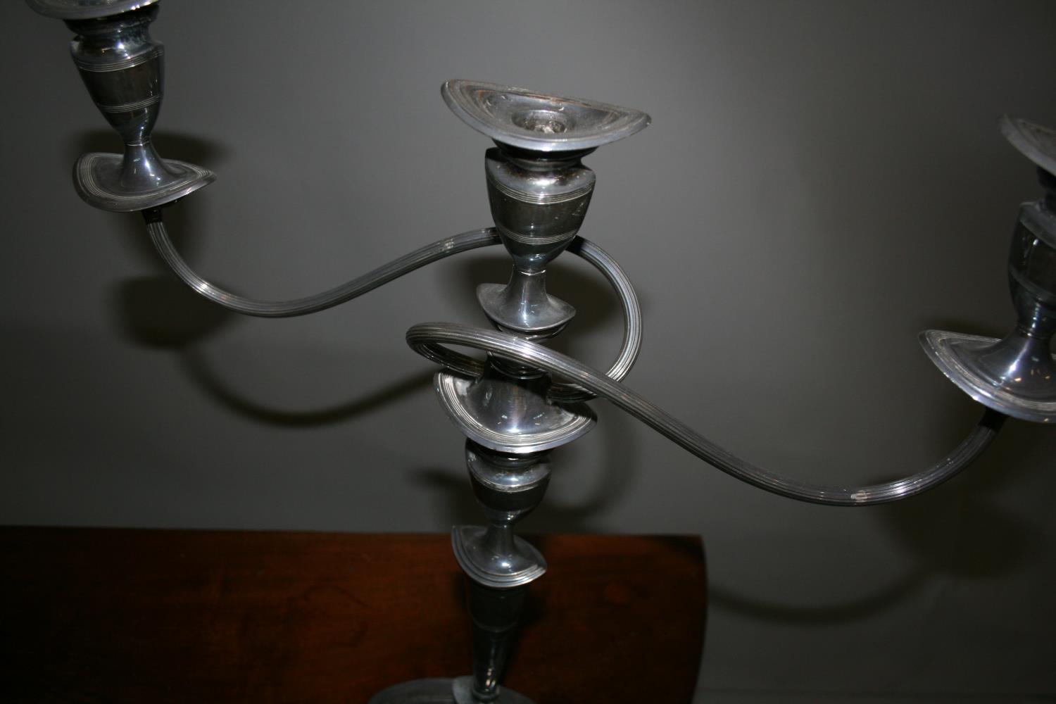 West & Son, Dublin, silver plated lamp base and a pair of candle sticks. - Image 3 of 3