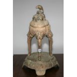 Unusual Oriental brass centre piece decorated with serpents, and top surmounted by a bird. 40W x