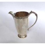 Plain U shape silver milk jug with Celtic border Height: 5” Weight: 4 ½” Birmingham 1937 by Adie