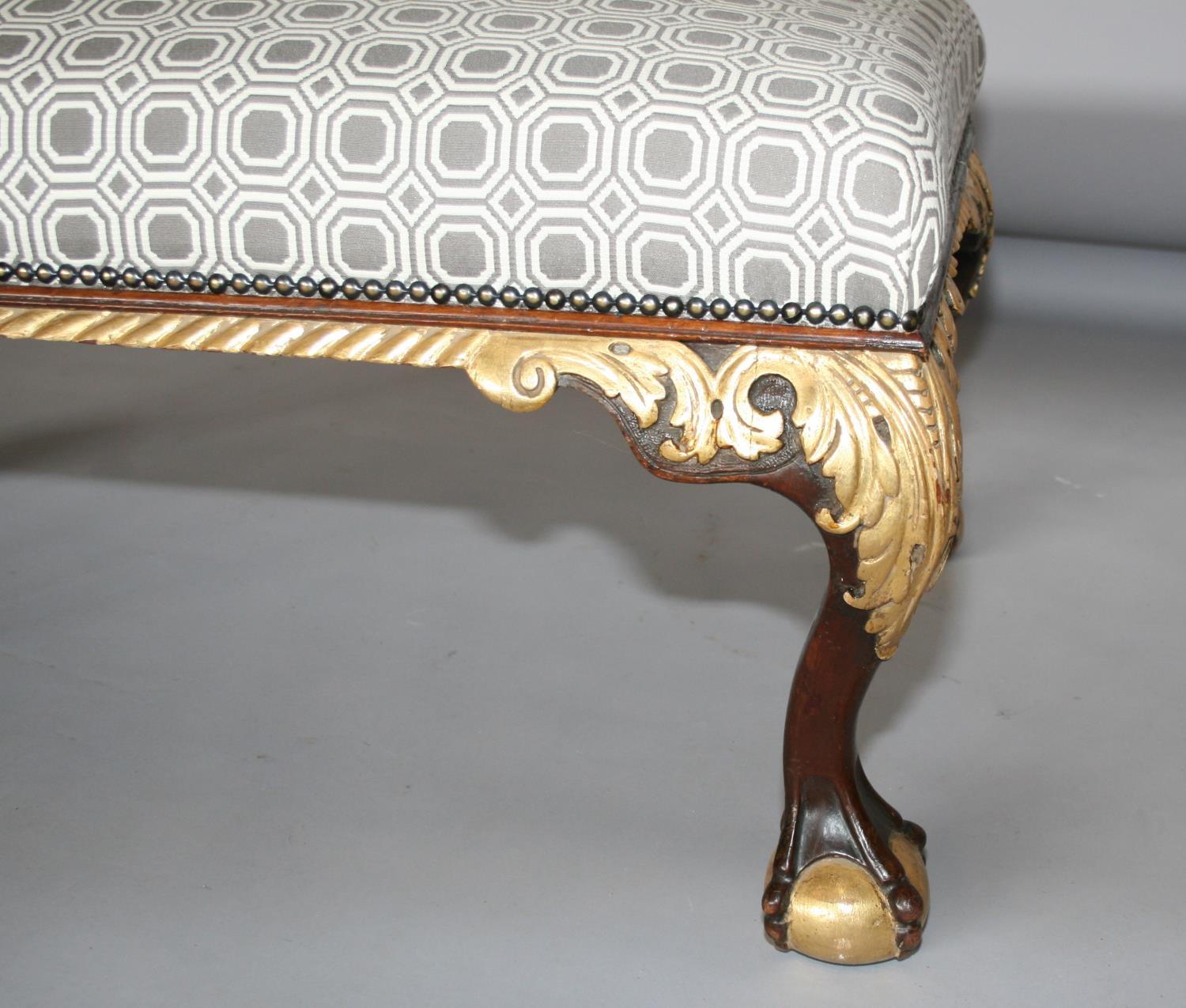 Decorative mahogany and gilt centre stool, upholstered with brass stud embellishment standing on - Image 2 of 3