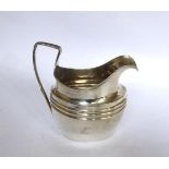 Georgian Irish silver oval milk jug. Height: 5”. Weight: 6ozs. Dublin c. 1805 by Daniel Egan.