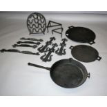 Collection of antique wrought iron and kitchen paraphernalia.