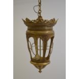 Large brass circular lantern with chain and rose. 47W 112H