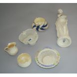 Selection of Belleek incl. basket, cup and saucer, robed figure (damaged).