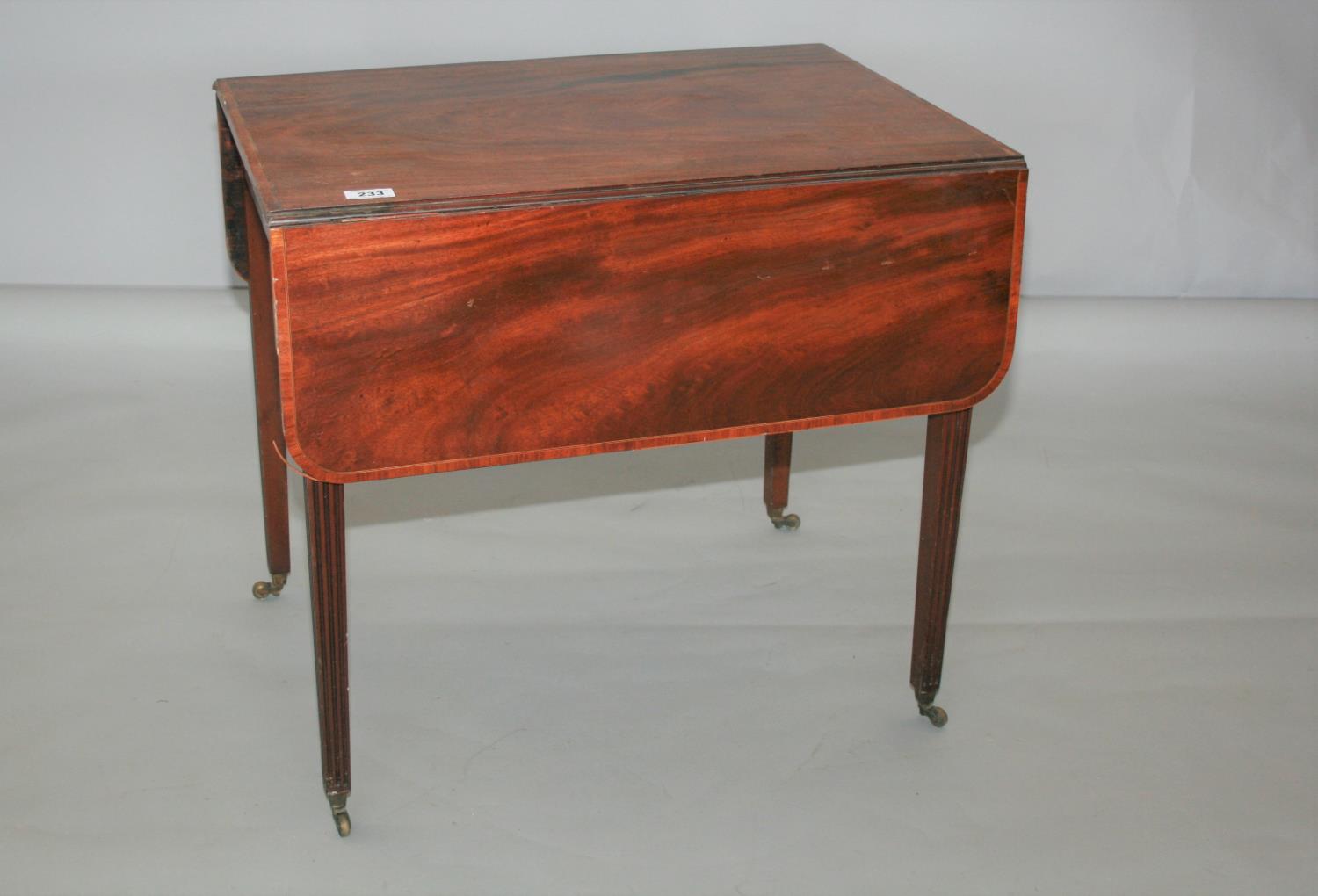 18th Century mahogany Pembroke table with rosewood and foxwood embellishment. 80W x 70 x 55D.