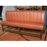 Fine quality fixed seating brown leather upholstered high seat with footrail and brass embellishment