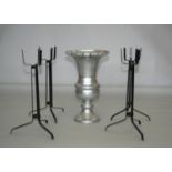 Chrome urn shaped vase (40W x 65H) and four black candle stand.