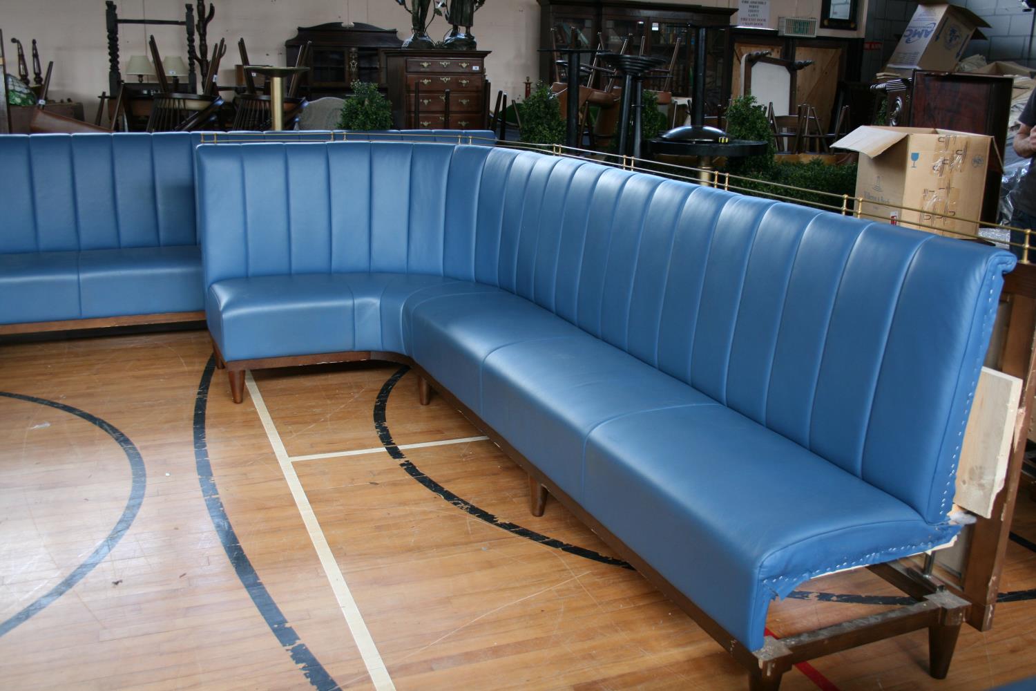 Very fine quality curved end free standing leather upholstered seating (upholstered on the back)