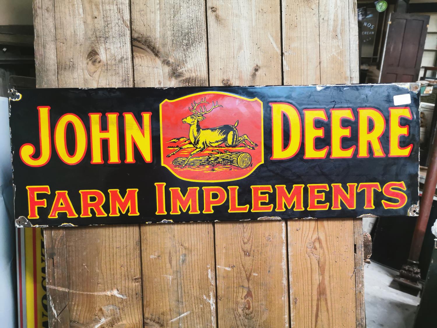 John Deere enamel advertising sign.