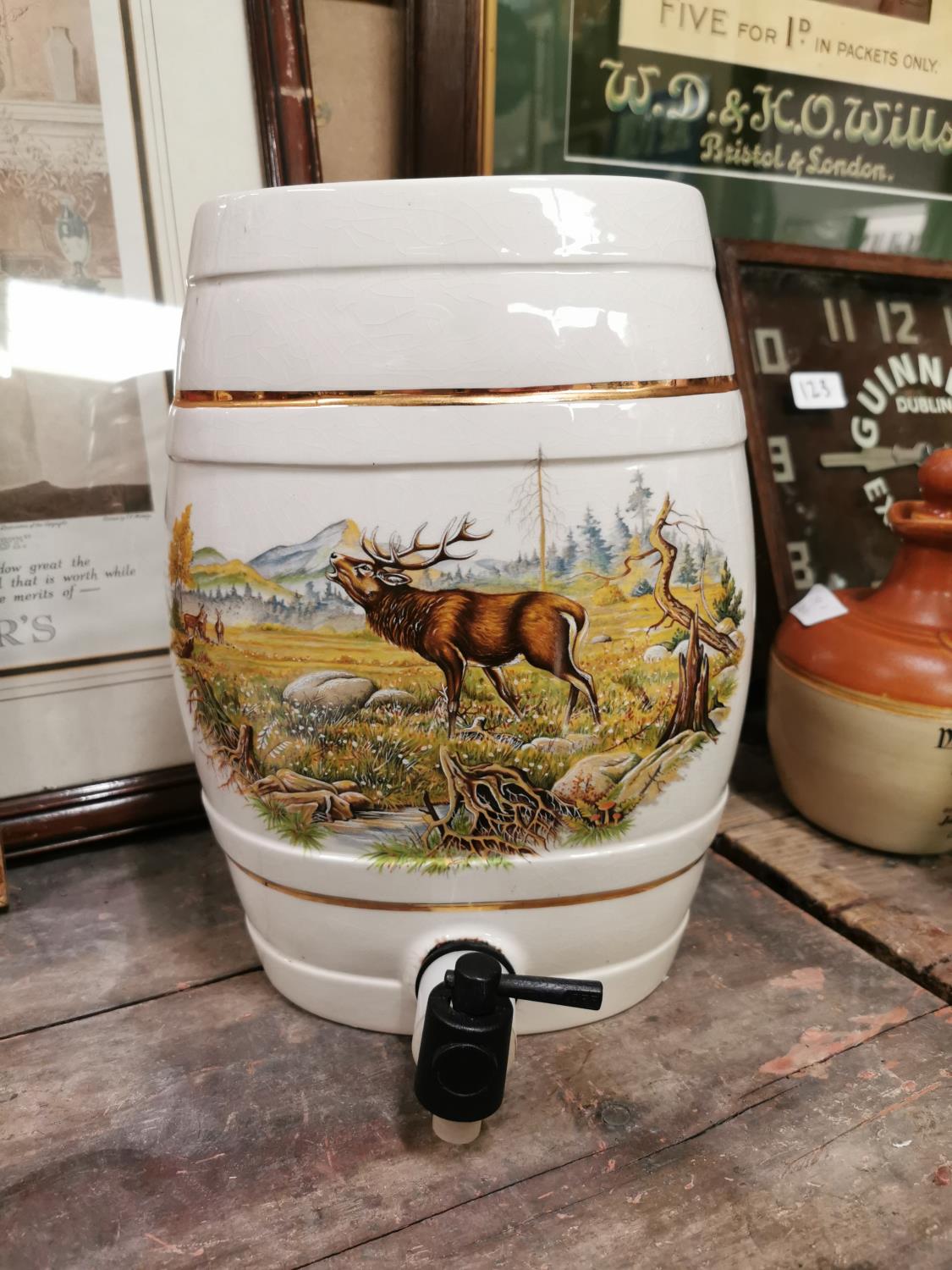 Ceramic whiskey dispenser.