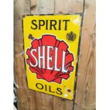 Spirit Shell Oil advertising sign.