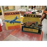 Two 1950s Meccano advertising showcards.