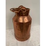 Copper milk can with unusual locking handle { 53cm H }.