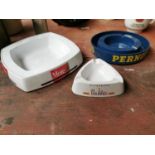 Three vintage advertising ashtrays.