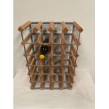 Twenty four bottle metal and wooden wine rack