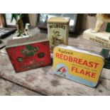 Three advertising tins.