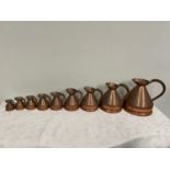 Graduated set of nine copper measures