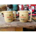 Two Hewitt's Scotch Whiskey advertising jugs.