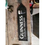 Guinness cast iron advertising sign.