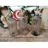 Three Thwaites glass soda siphons.