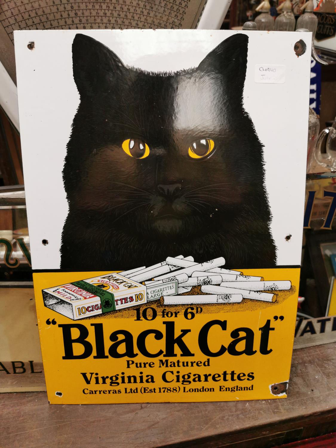 Black Cat Virginia Cigarettes advertising sign.