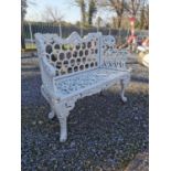 Decorative cast iron two seater garden bench.