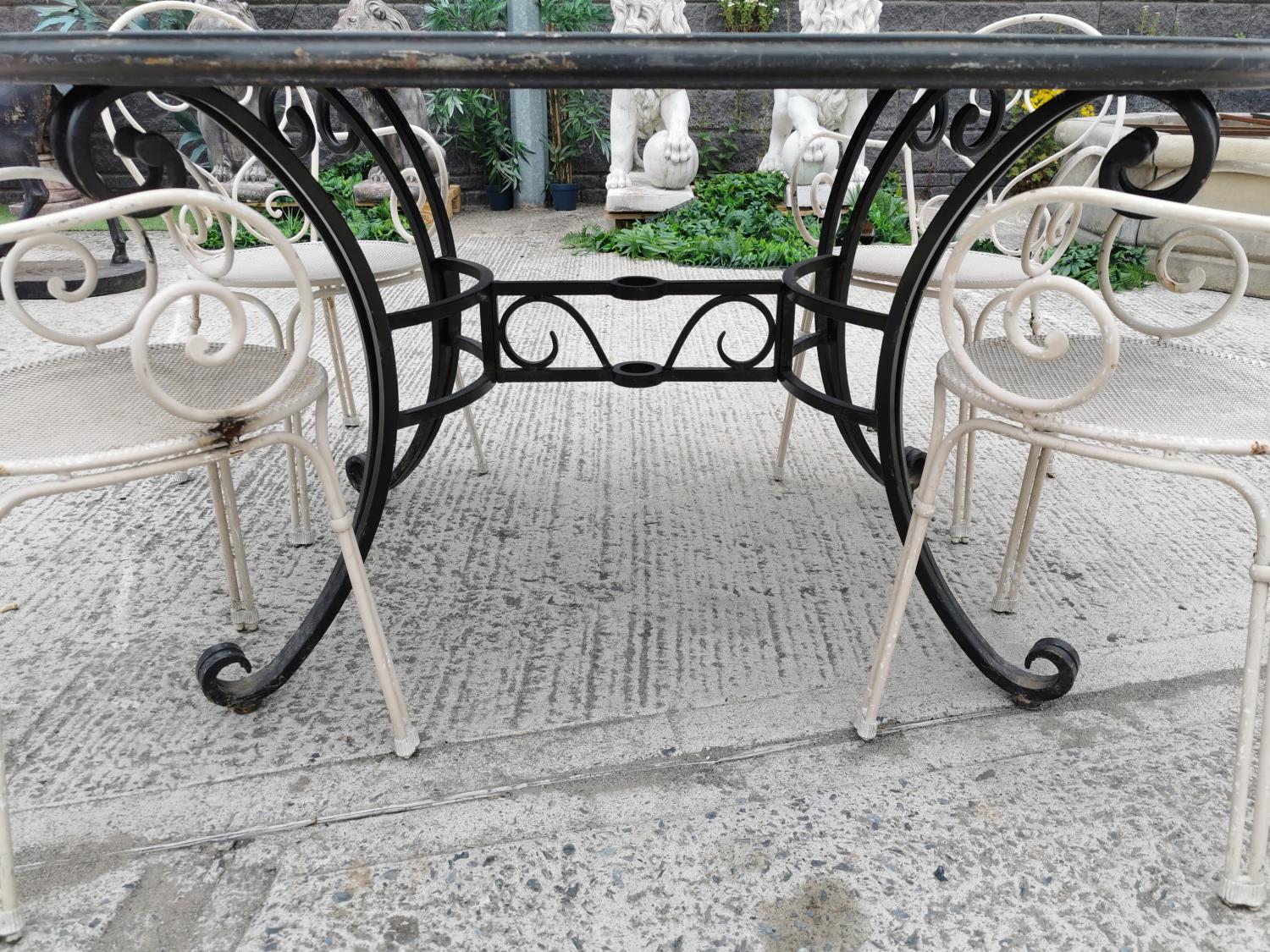 Wrought iron garden table and four chairs. - Image 4 of 4