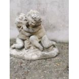 Composition model of kissing Putti's.